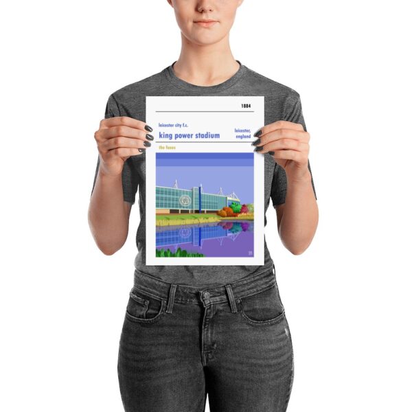 A small football poster of Leicester City and the King Power Stadium