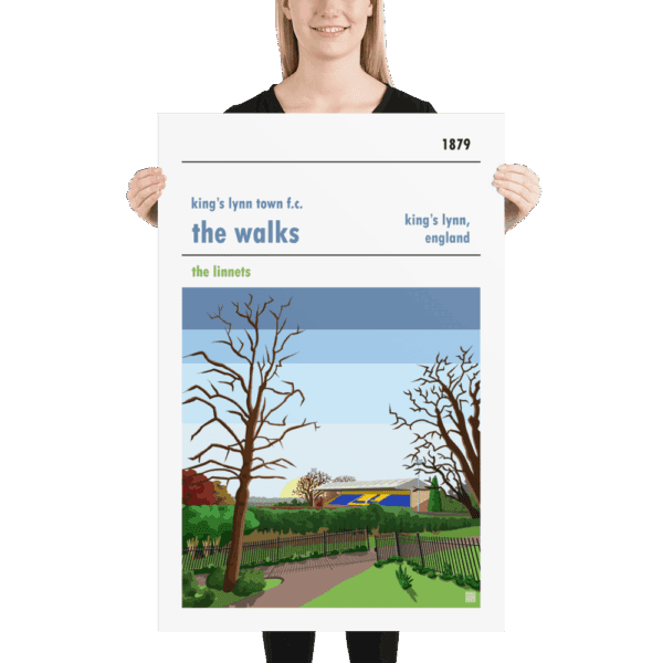 A large football poster of sunrise over The Walks and King’s Lynn Town FC