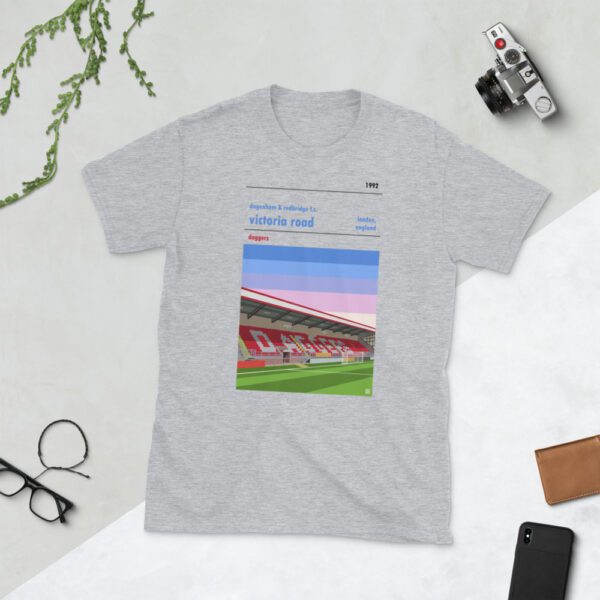 A light grey Dagenham & Redbridge tee lying on the floor