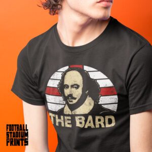 A man sitting down wearing a black William Shakespeare T-Shirt