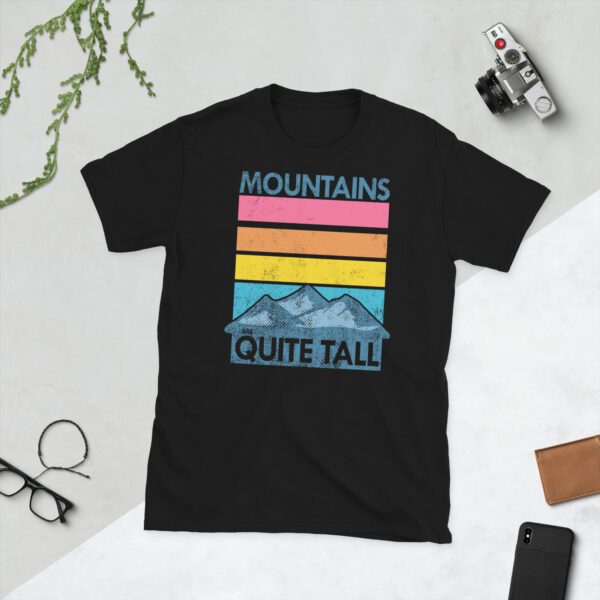 Black tee shirt laid out flat with mountain graphic and 'Mountains are quite tall' text for men