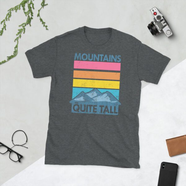 Heather-colored men's t-shirt laid out flat with mountain graphic and 'Mountains are quite tall' text.