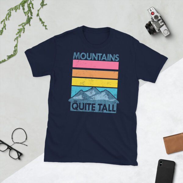 Navy tshirt laid out flat with mountain graphic and 'Mountains are quite tall' text for men.