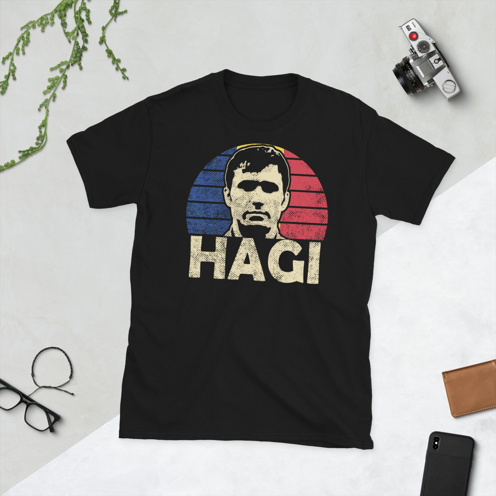 Honour Romanian footballing legend Gheorghe Hagi with this striking Gheorghe Hagi T-shirt. Featuring the "Maradona of the Carpathians" name in bold, it's a must-have for fans of Romanian brilliance.