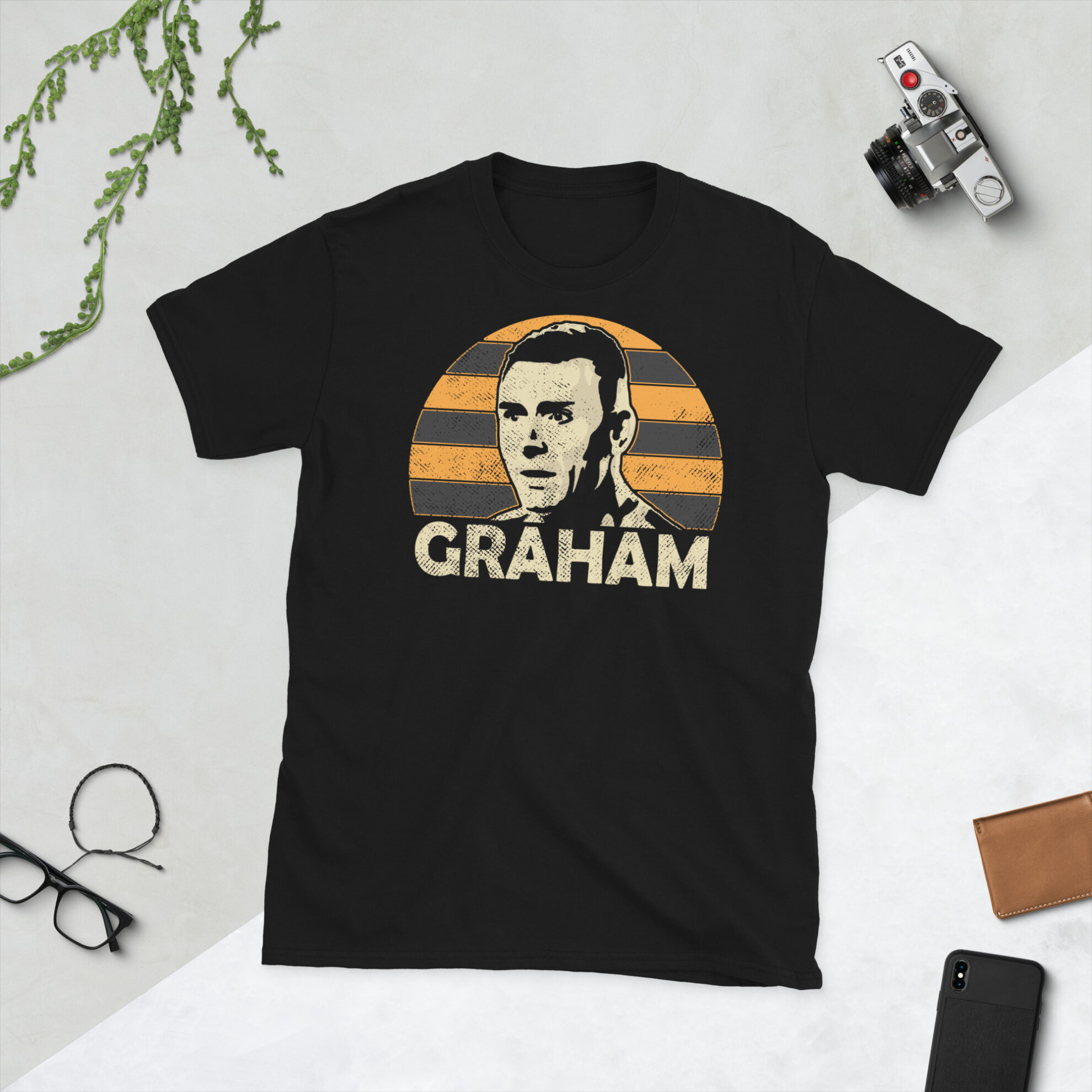 Andy Graham T-Shirt in Black: A black T-shirt featuring an Alloa Athletic sunburst and the word "GRAHAM" in bold, honoring Alloa Athletic manager Andy Graham.