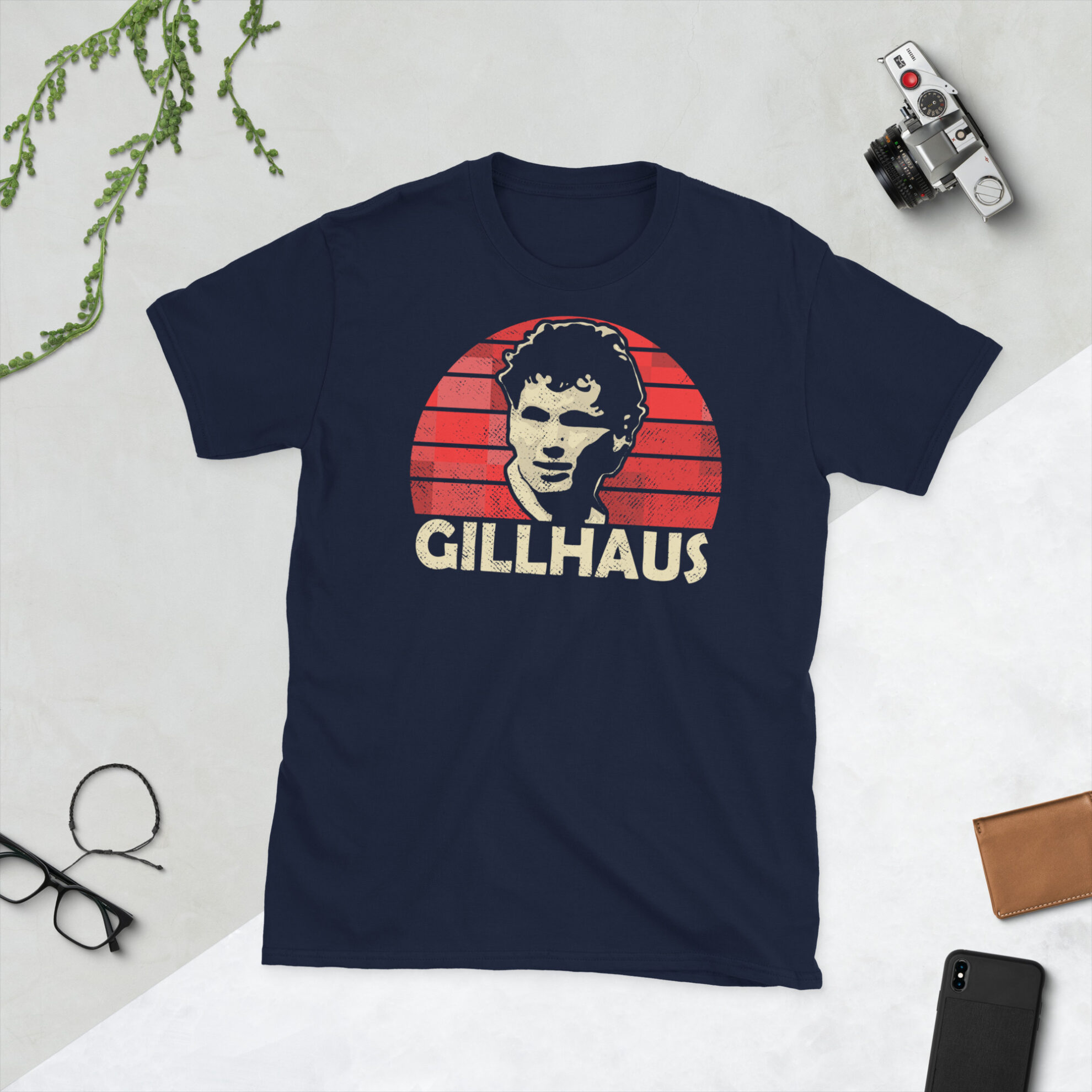 A navy Hans Gillhaus Aberdeen FC t-shirt featuring a red sunburst design and the word "GILLHAUS" printed prominently in bold.