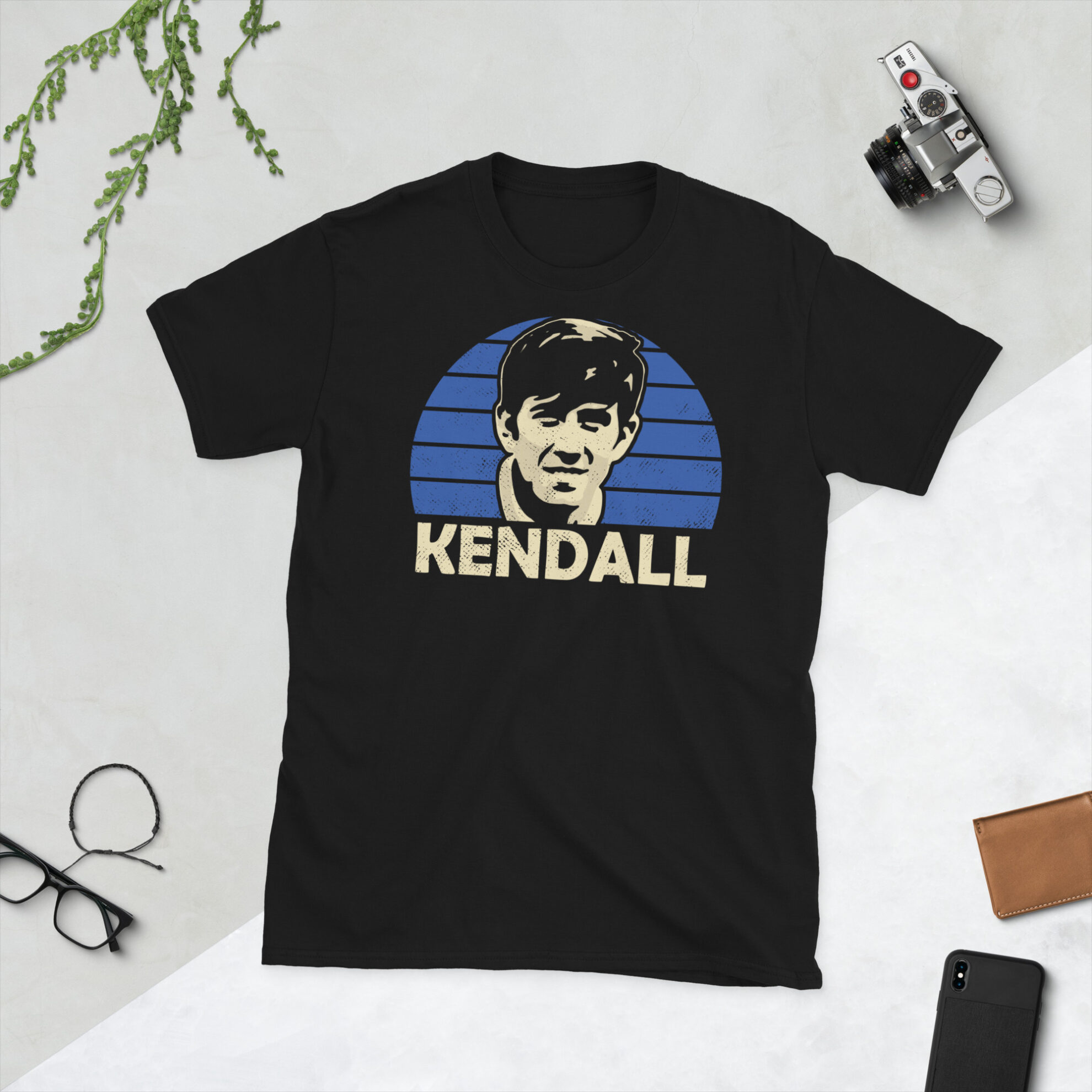 A black Howard Kendall Everton FC t-shirt featuring a blue sunburst design and the word "KENDALL" printed prominently in bold.