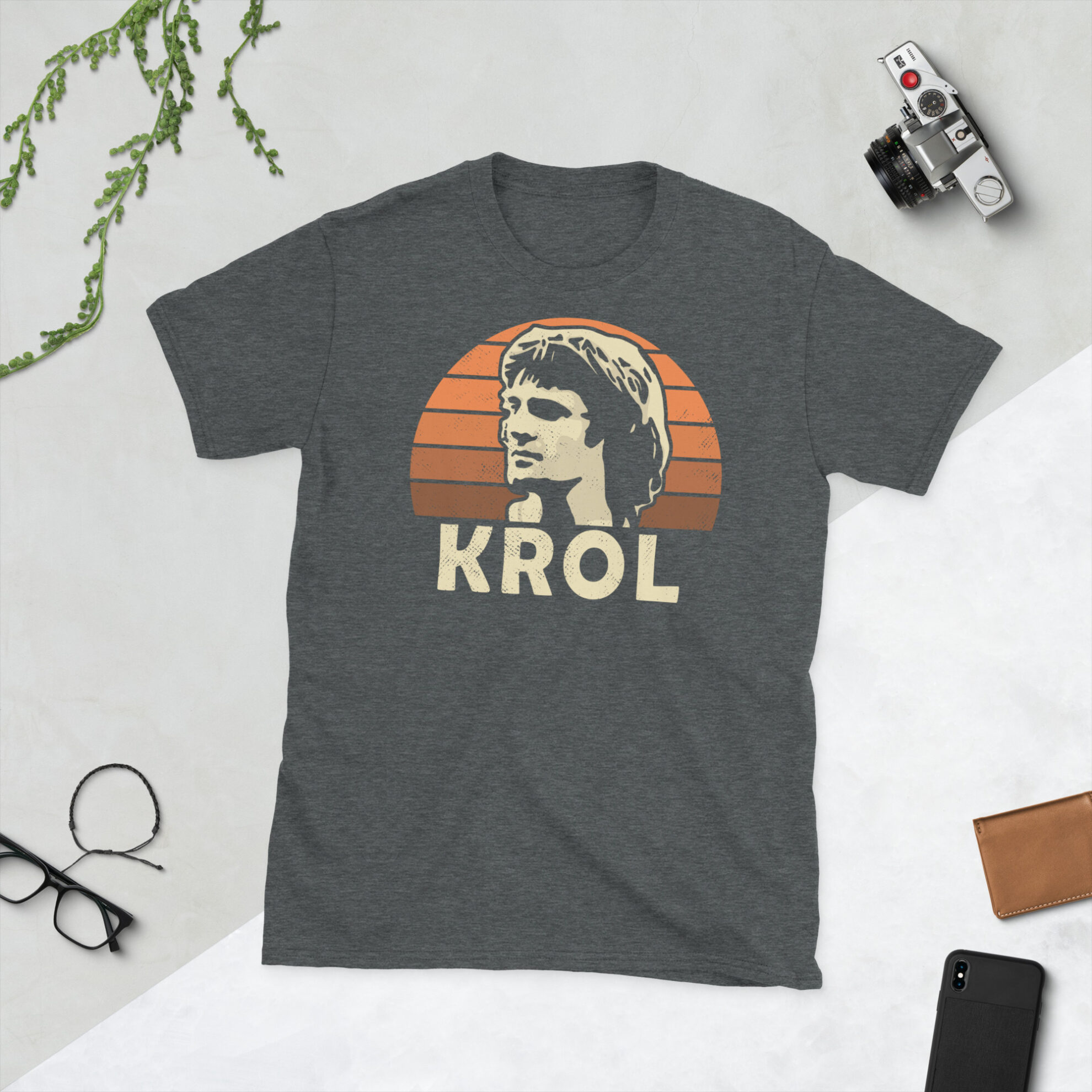 A heather grey Ruud Krol T-Shirt featuring an orange sunburst design (inspired by the Netherlands national team colours) and "KROL" printed prominently in bold.