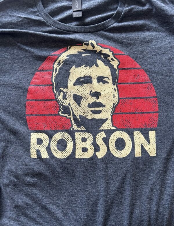 A photo of a heather version of our Bryan Robson T-Shirt