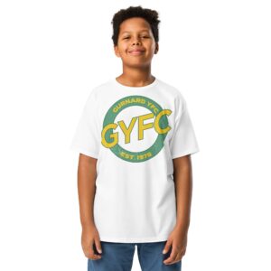 A boy wearing a white Youth Gurnard YFC anniversary t-shirt with circular badge design featuring GYFC logo and club text, sizes XS-XL.