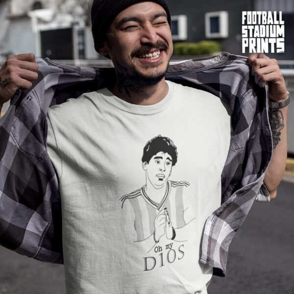 A man wearing a white t-shirt of Diego Maradona and Oh My DIOS on the front