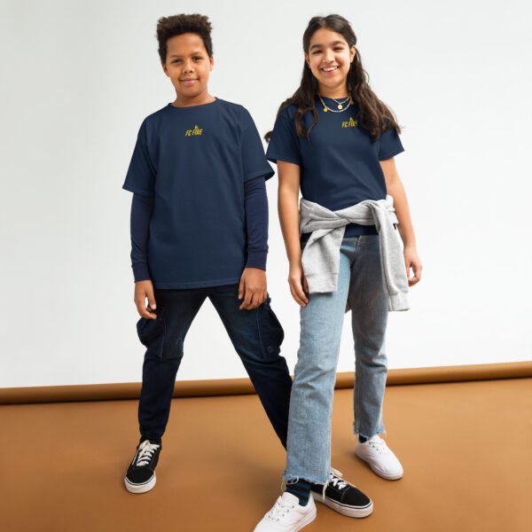 Teen boy and girl wearing navy FC Fire gold logo t-shirts – football streetwear from Enfield