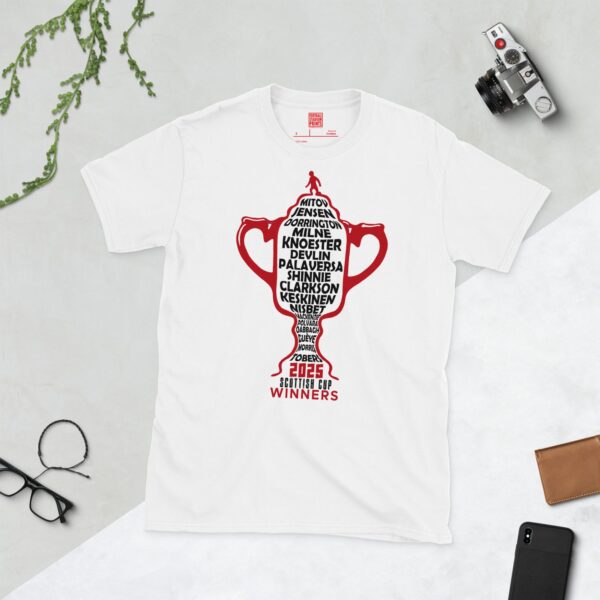A white T-shirt featuring a red outline of the Scottish Cup, with black text listing the names of every Aberdeen player from the 2025 Scottish Cup winning team, and "2025 SCOTTISH CUP WINNERS" below.