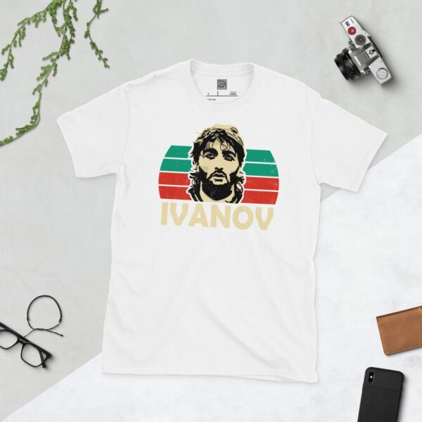 A white T-shirt featuring a graphic of Trifon Ivanov's face against a sunburst in the white, green, and red colours of the Bulgarian national flag, with "IVANOV" written below.