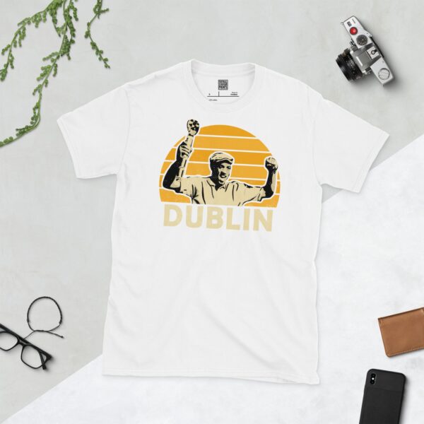 Show your Cambridge United pride in this white Dion Dublin T-shirt. It features a yellow sunburst design with "DUBLIN" written under the main graphic.