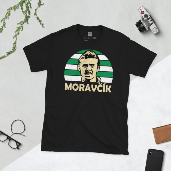 A black Lubo Moravcik T-shirt featuring a green and white striped sunburst design with "MORAVCIK" written under the main graphic.