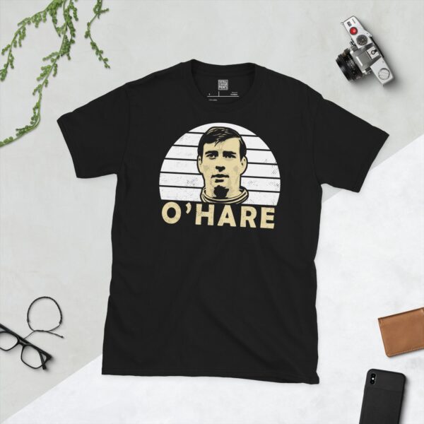 A black John O'Hare T-shirt featuring a white sunburst design with "O'Hare" written under the main graphic.