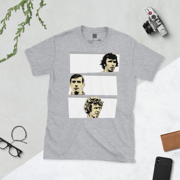 A sports grey T-shirt featuring a design with three stacked white blocks. Each block contains a stencil image of a Derby County legend: Kevin Hector, Alan Hinton, and John O'Hare, celebrating the club's league winners.