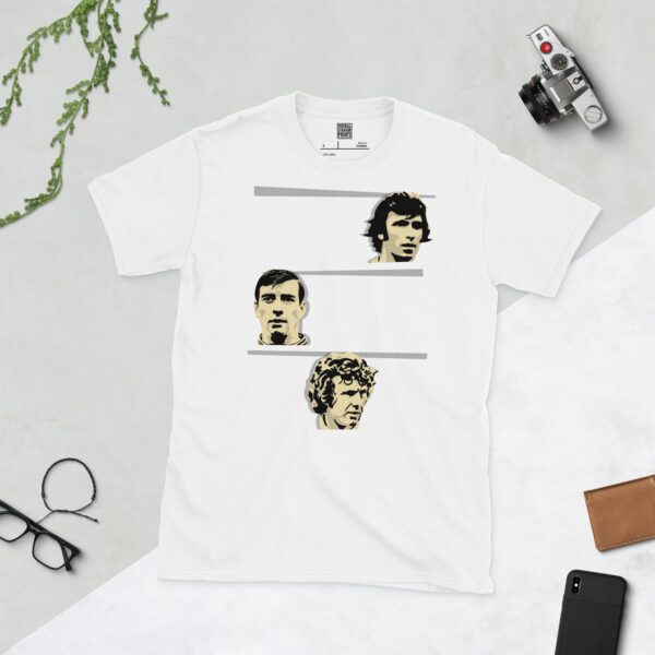 Show your Derby County pride in this white T-shirt. It features a design with three stacked white blocks, each containing a stencil image of Kevin Hector, Alan Hinton, and John O'Hare, honouring the club's league winners.