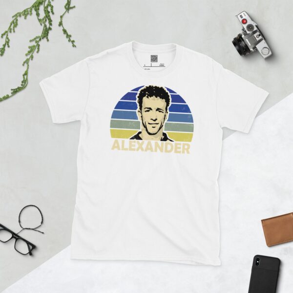 Show your Greenock Morton pride in this white Rowan Alexander T-shirt. It features a blue fading to yellow sunburst design with "ALEXANDER" written under the main graphic.