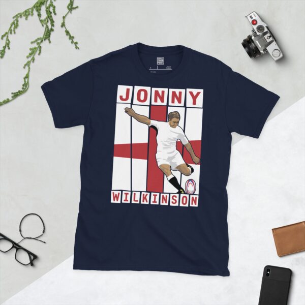 A navy blue T-shirt featuring a graphic of England rugby legend Jonny Wilkinson in his distinctive pose, taking a kick.