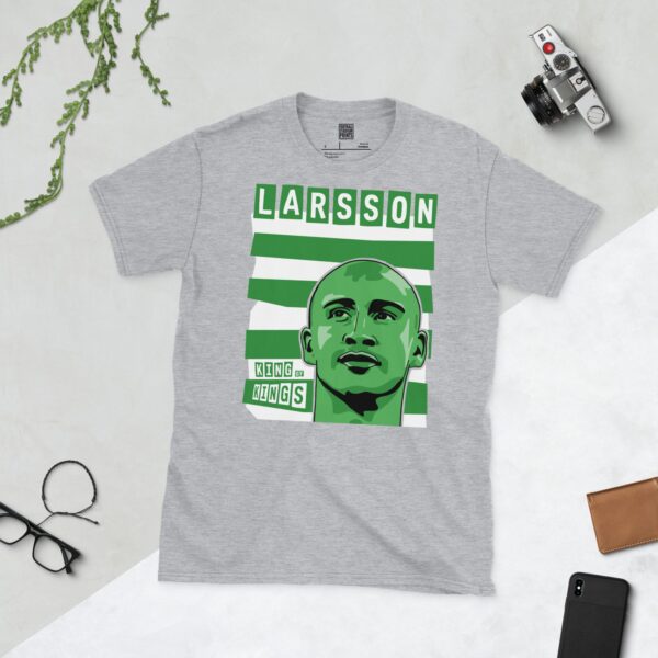 A versatile sports grey T-shirt showcasing a dynamic illustration of Henrik Larsson, the beloved Celtic striker. The design includes his portrait over a vibrant green and white striped background, crowned with "LARSSON" and "KING OF KINGS".