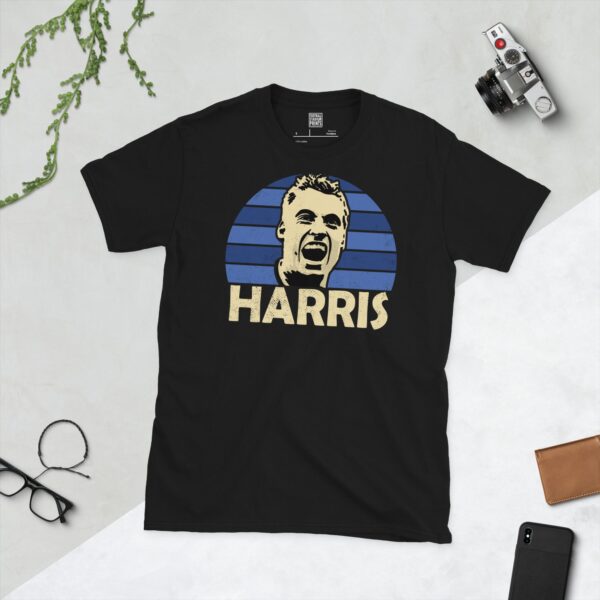 A black Neil Harris T-shirt featuring a blue sunburst design with "HARRIS" written under the main graphic.