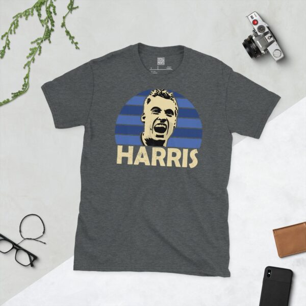 A dark heather Neil Harris T-shirt featuring a blue sunburst design with "HARRIS" written under the main graphic.