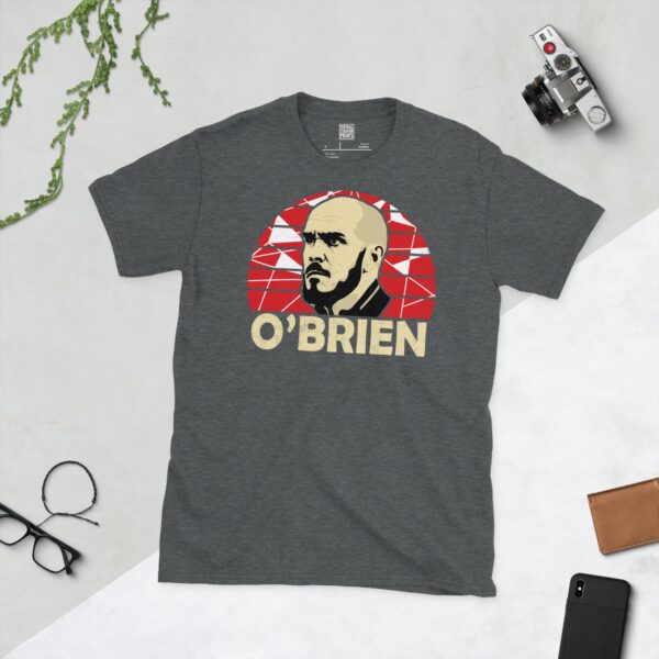 A dark heather Joey O'Brien T-shirt featuring a red sunburst design with "O'BRIEN" written under the main graphic.