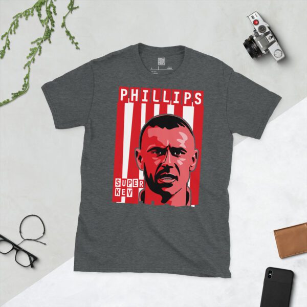 A subtle dark heather T-shirt emblazoned with a stylised portrait of former Sunderland goal machine Kevin Phillips. The design incorporates the famous red and white stripes behind his image, alongside his name "PHILLIPS" and the fitting title "SUPER KEV".