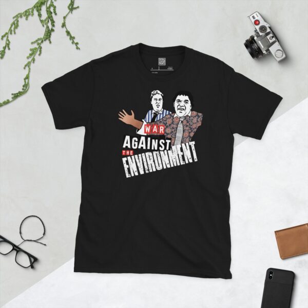 A black t-shirt featuring a graphic of Vic Reeves and Bob Mortimer as their "Free Runners" characters, with the slogan "WAR AGAINST THE ENVIRONMENT" in bold white text.
