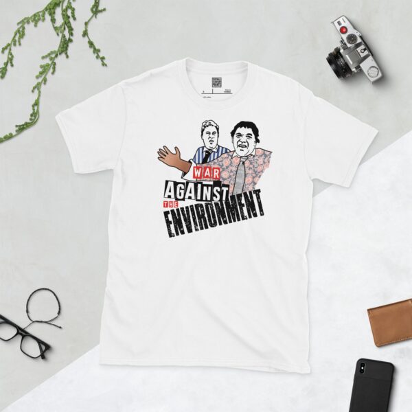 A white t-shirt featuring a graphic of Vic Reeves and Bob Mortimer as their "Free Runners" characters, with the slogan "WAR AGAINST THE ENVIRONMENT" in bold black text.