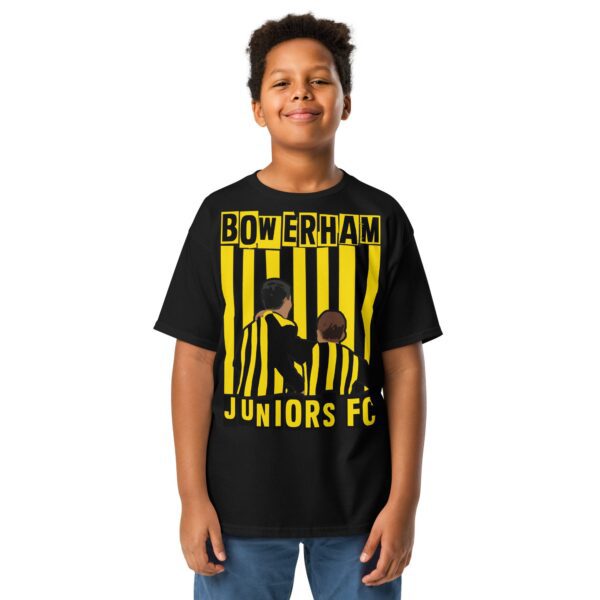A bold black youth T-shirt emblazoned with a striking graphic of two boys in black and yellow stripes on the front for Bowerham Juniors FC.