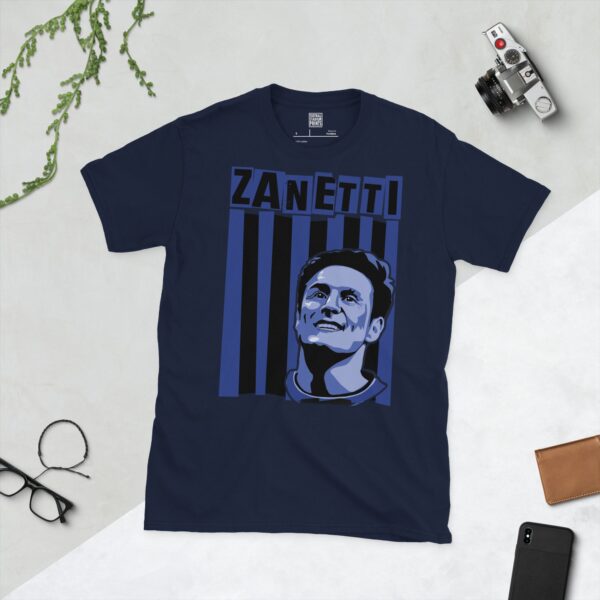 A deep navy blue T-shirt featuring a compelling graphic of Javier Zanetti, the legendary Inter Milan defender, with his image set against a vivid black and blue striped design. His iconic surname "ZANETTI" is clearly visible, paying tribute to his time at the club.