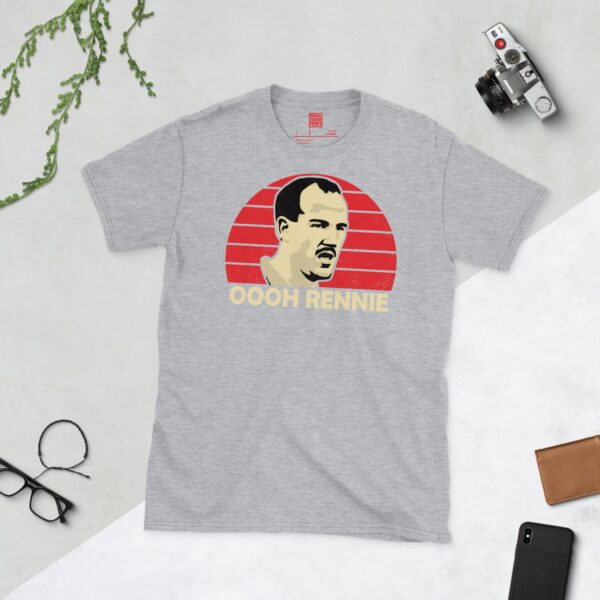 A versatile sports grey T-shirt showcasing a dynamic illustration of Dave Rennie, the beloved Bristol City midfielder. The design includes his portrait over a bold red radiating pattern, with "OOOH RENNIE" clearly visible underneath, celebrating the fan favourite.