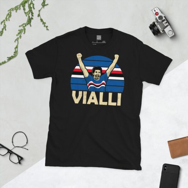 A bold black T-shirt emblazoned with a striking portrait of Sampdoria icon Gianluca Vialli. The graphic depicts him celebrating against a backdrop of the club's famous stripes, and his surname "VIALLI" is a central feature below the image.