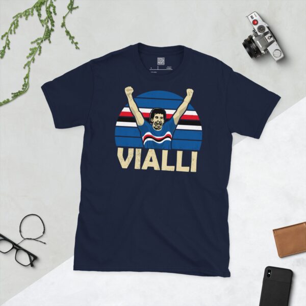 A deep navy blue T-shirt featuring a compelling graphic of Gianluca Vialli, the legendary Sampdoria forward, with his image set against a vivid striped design in the club's colours. His iconic surname "VIALLI" is clearly visible, paying tribute to his time at the club.