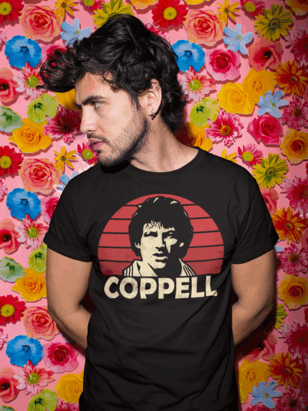 A man wearing a black tee featuring Manchester United Legend Steve Coppell