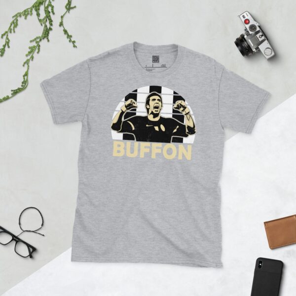 A versatile sports grey T-shirt showcasing a dynamic illustration of Gianluigi Buffon, the beloved Juventus goalkeeper. The design includes his portrait over a bold black and white striped radiating pattern, with "BUFFON" clearly visible underneath.