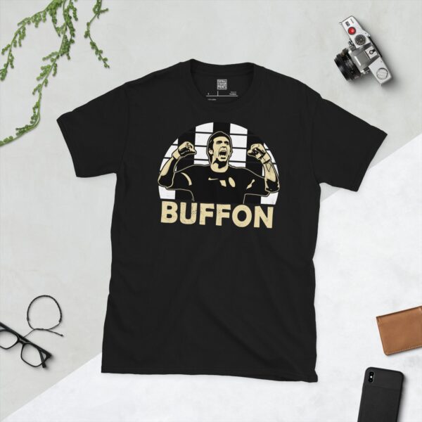 A bold black T-shirt emblazoned with a striking portrait of Juventus icon Gianluigi Buffon. The graphic depicts him celebrating against a backdrop of black and white striped sunburst lines, and his surname "BUFFON" is a central feature below the image.