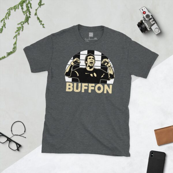 A subtle dark heather T-shirt displaying a distinctive graphic of former Juventus maestro Gianluigi Buffon. His portrait is captured in a moment of celebration against a retro black and white striped sunburst effect, with his surname "BUFFON" directly beneath the illustration.