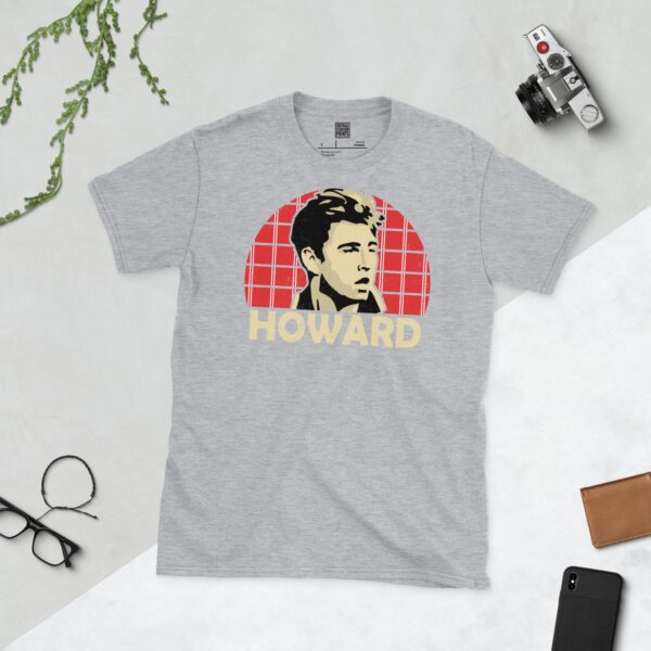 A versatile sports grey T-shirt showcasing a dynamic illustration of Terry Howard, the beloved Leyton Orient defender. The design includes his portrait over a bold red and white pinstriped radiating pattern, with "HOWARD" clearly visible underneath.