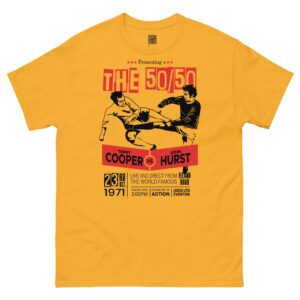 A gold/yellow T-shirt featuring a boxing-style poster graphic. The design shows two footballers, one in white (Leeds United) and one in blue (Everton), locked in a 50/50 challenge during a match. The text "LEEDS v EVERTON 1971" is printed above the players.