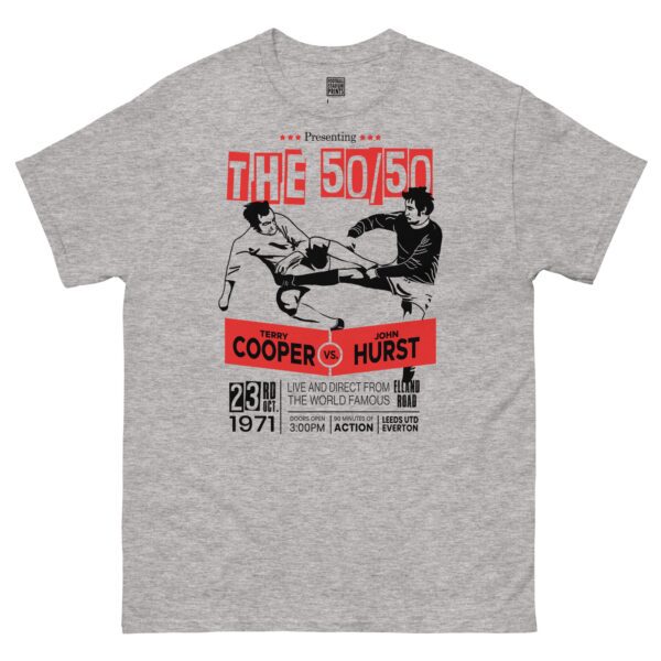 A sports grey T-shirt featuring a boxing-style poster graphic. The design shows two footballers, one in white (Leeds United) and one in blue (Everton), locked in a 50/50 challenge during a match. The text "LEEDS v EVERTON 1971" is printed above the players.