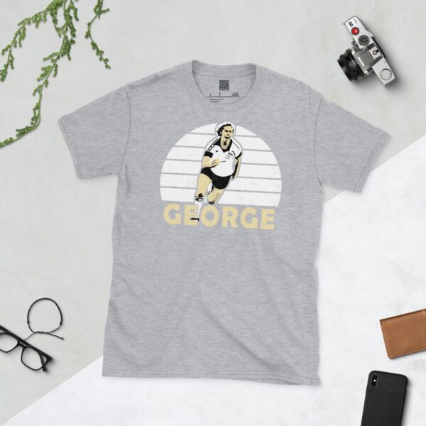A sports grey T-shirt featuring a unique graphic of Derby County's Charlie George. The image is backed by a white sunburst and the text "GEORGE" is printed below the portrait.