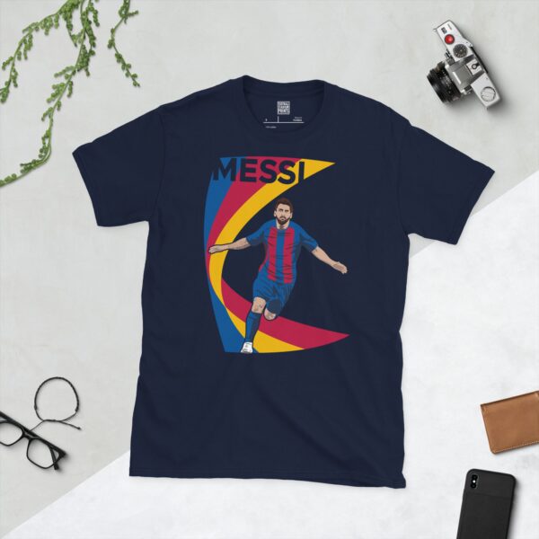 A navy T-shirt displaying a stylised illustration of Lionel Messi in a football kit. The graphic includes a multi-coloured swooping element and the name "MESSI" appears above the portrait.