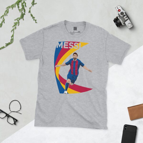 A sports grey T-shirt featuring a unique graphic of Lionel Messi, with "MESSI" above his image, set against a multi-coloured swooping background.