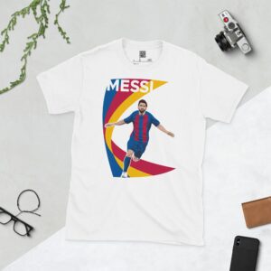 A white T-shirt with a contemporary graphic of Lionel Messi celebrating a goal. The text "MESSI" is above the image, which is backed by a dynamic red, blue, and yellow swooping design.