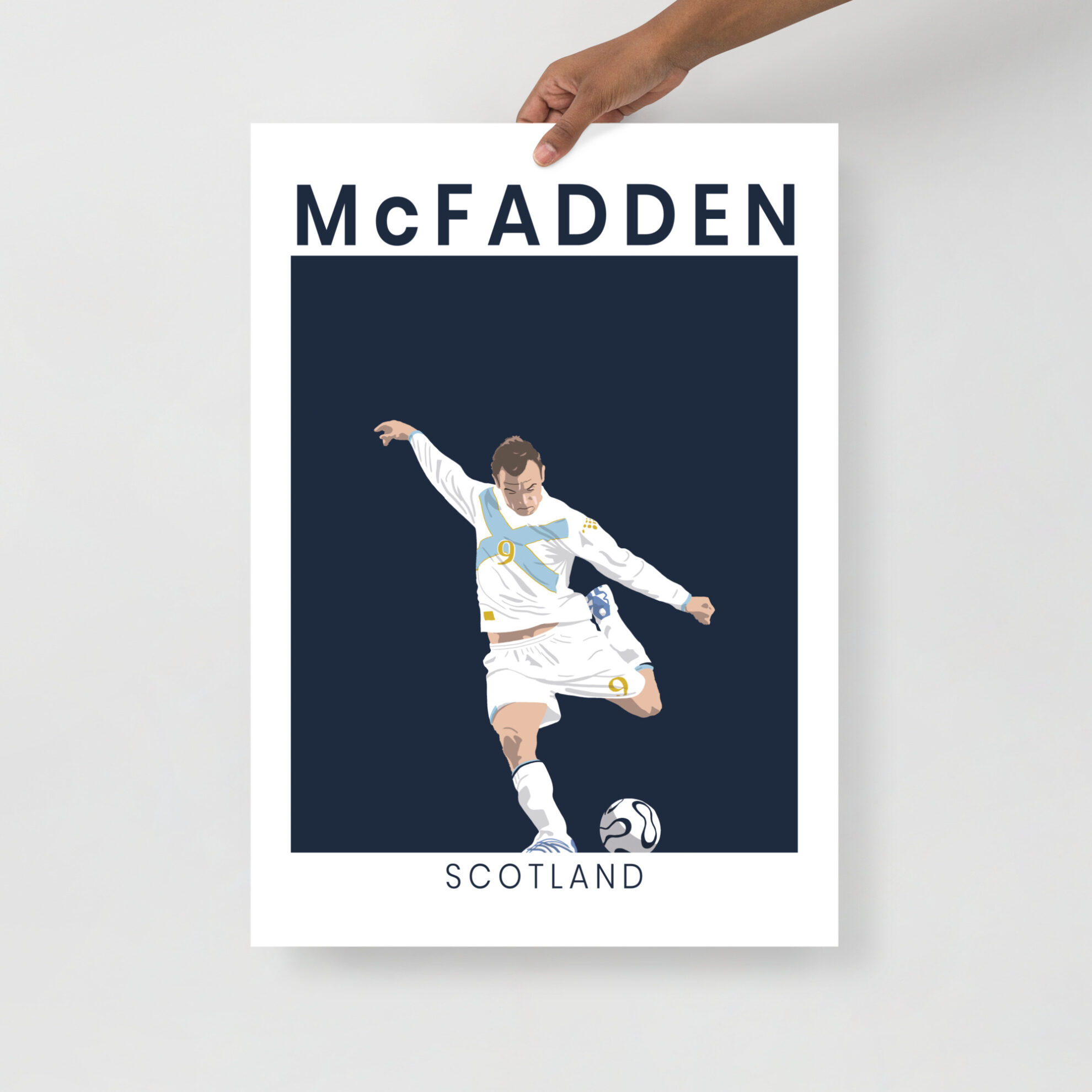 A minimalist art print of James McFadden striking the ball in his white and saltire-blue Scotland away kit against France in Paris.