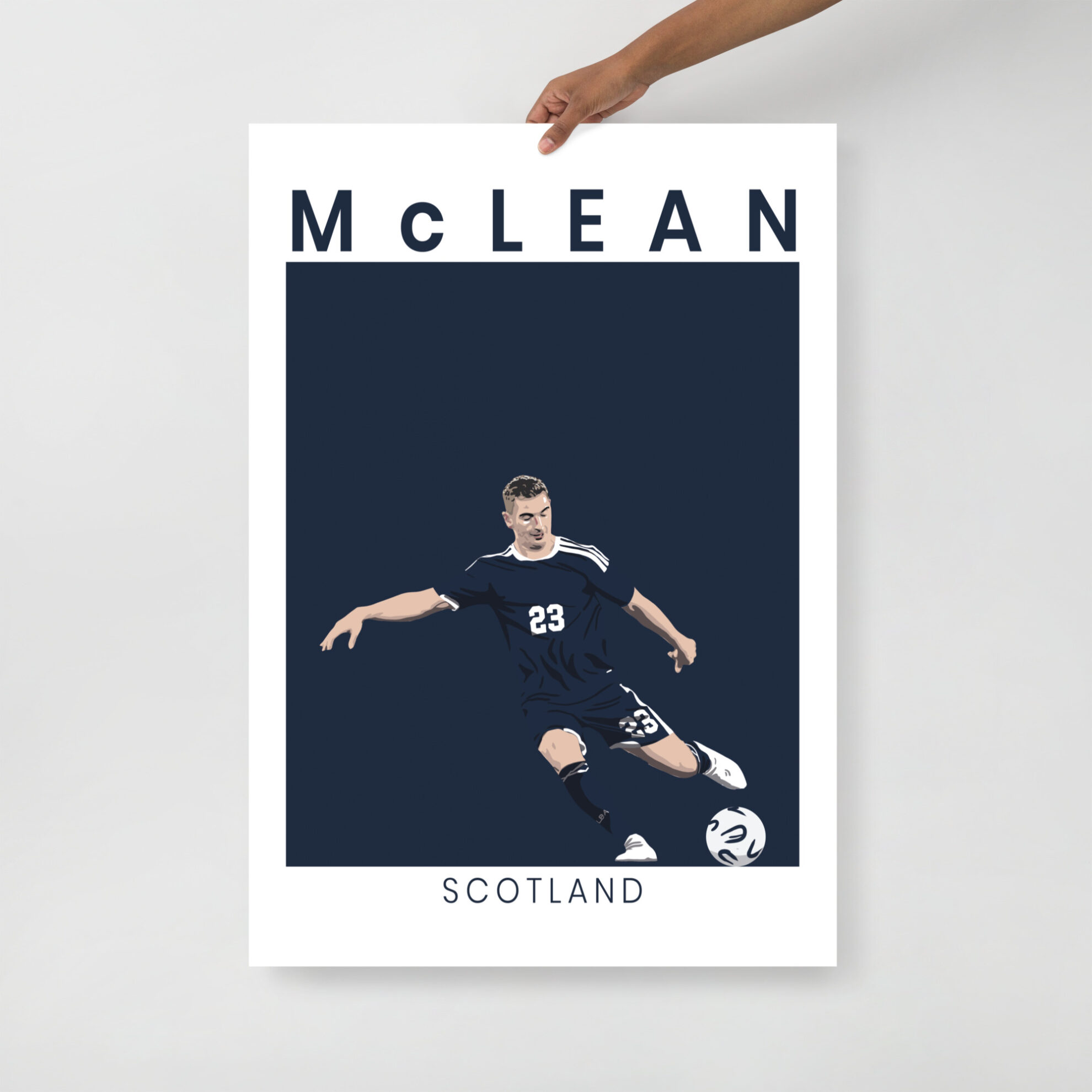 A stylised art print of Kenny McLean in a goal-scoring pose for Scotland against Denmark, featuring a minimalist navy and white design.